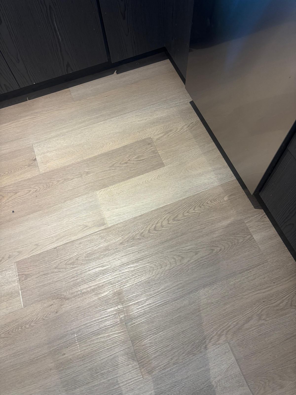 Seamless luxury vinyl plank (LVP) and hardwood flooring installation for a clean, modern look