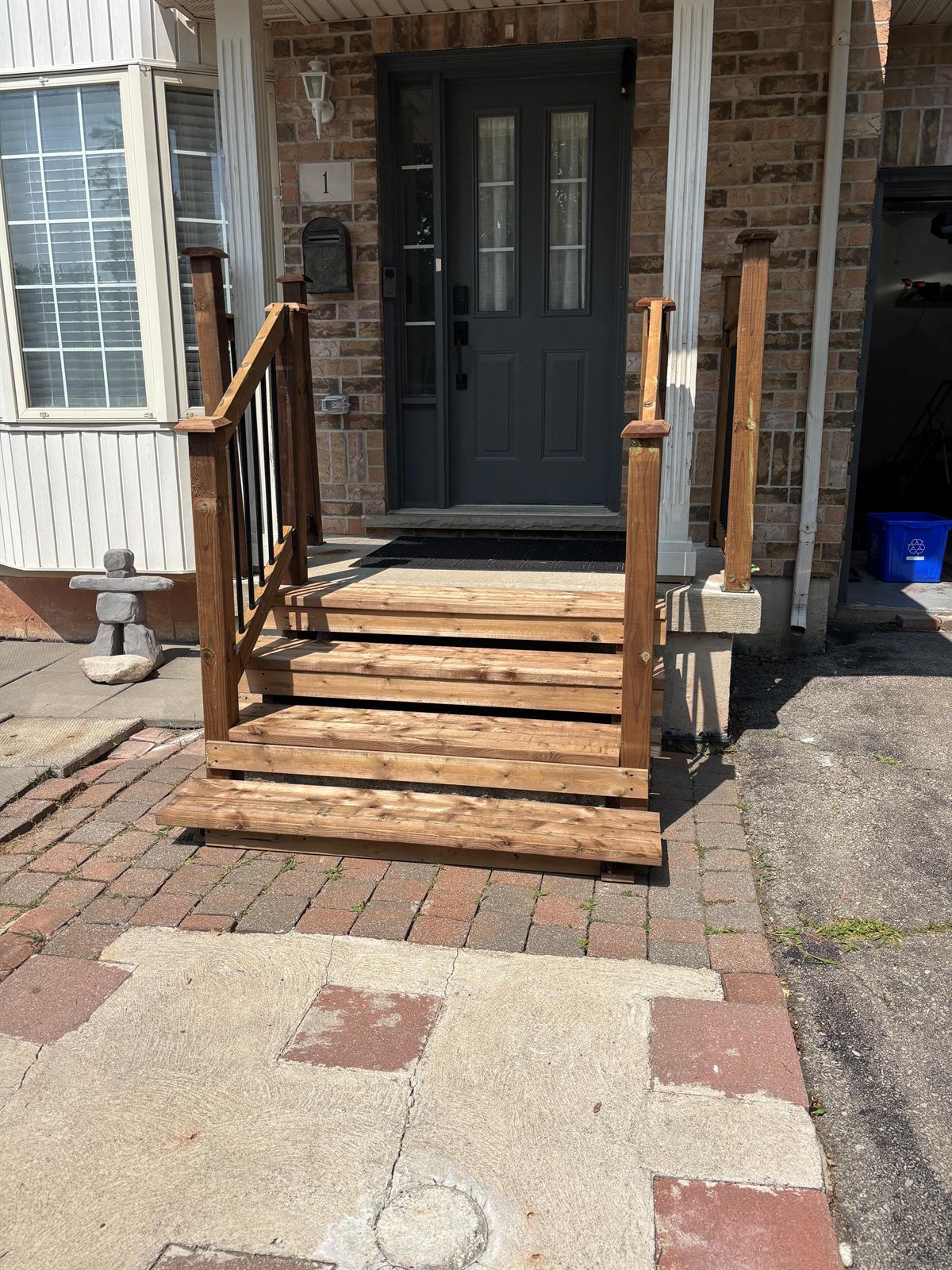 Custom wooden front porch and staircase reconstruction for enhanced curb appeal and safety