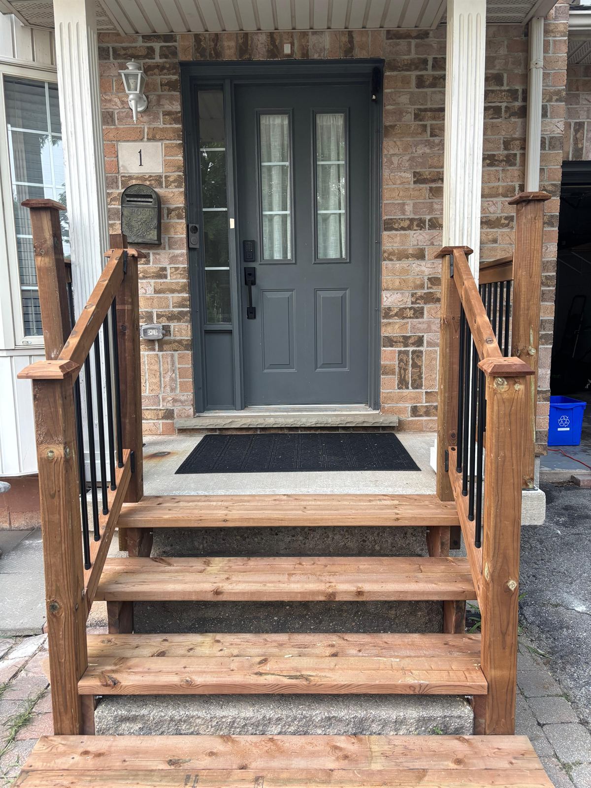 Custom wooden front porch and staircase reconstruction for enhanced curb appeal and safety